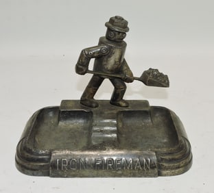 'Iron Fireman' ashtray, 4 1/2"
