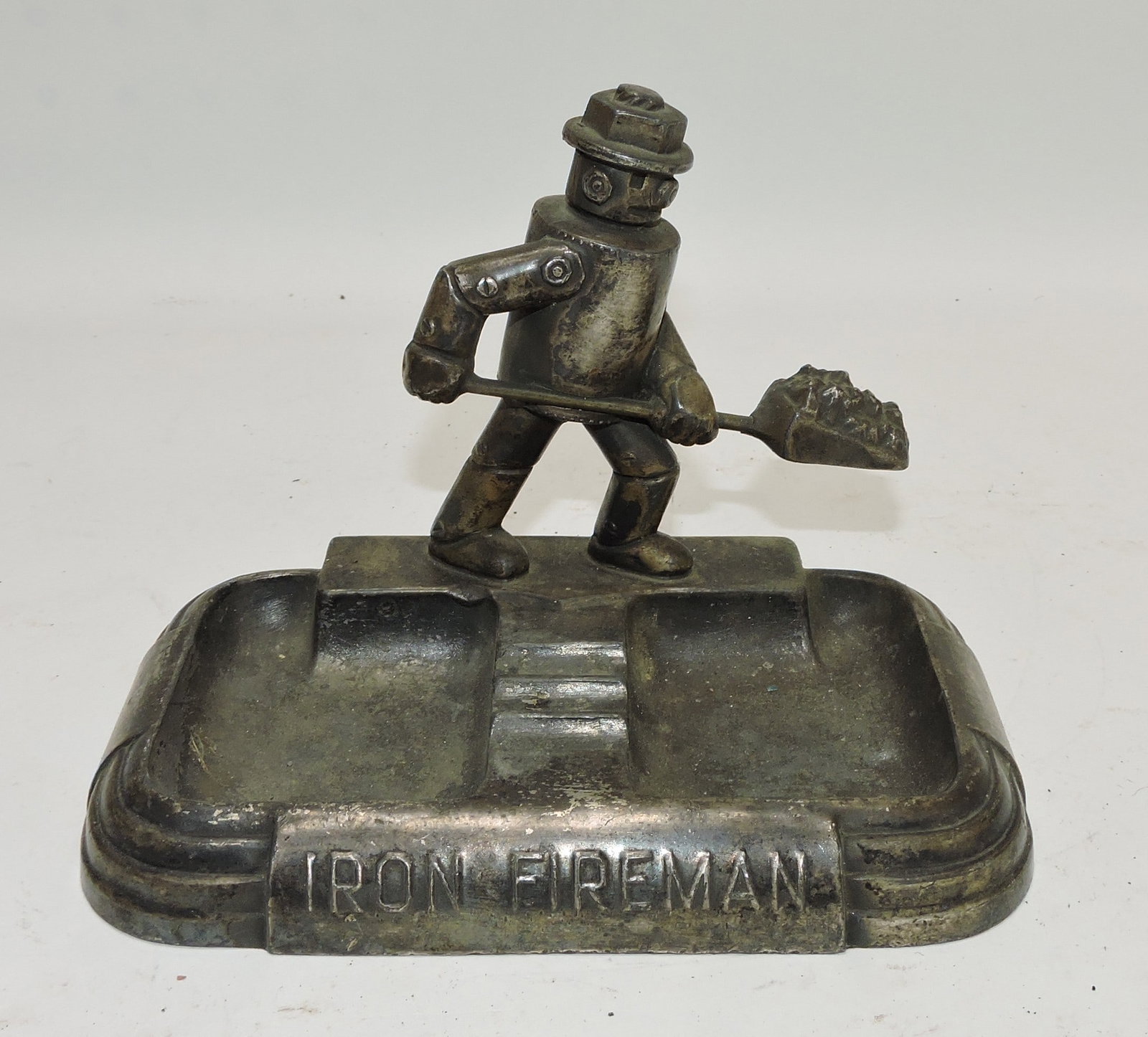 'Iron Fireman' ashtray, 4 1/2": .