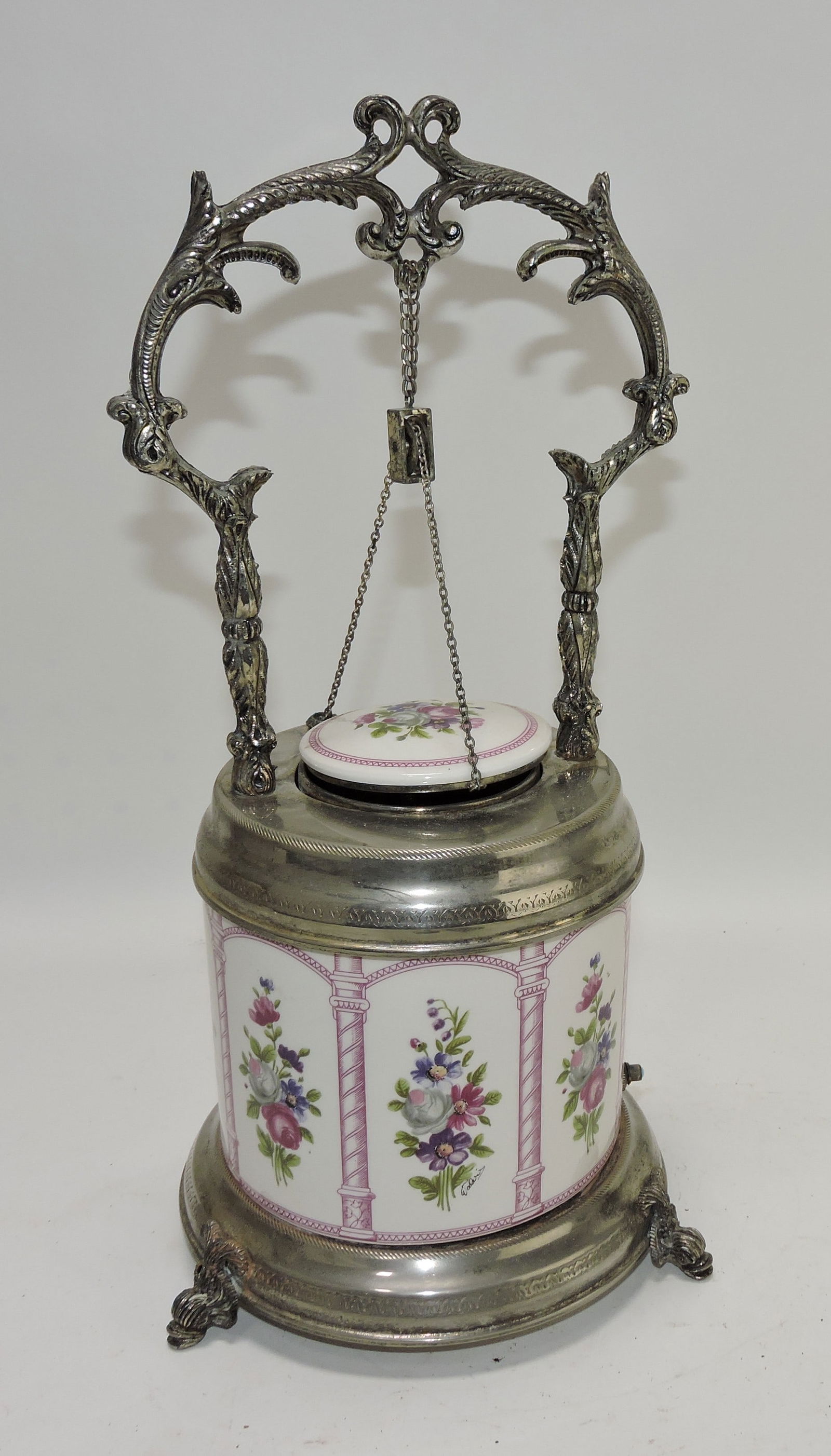 Ornate musical wishing well cigarette: dispenser with ceramic and metal elements, works, 14"