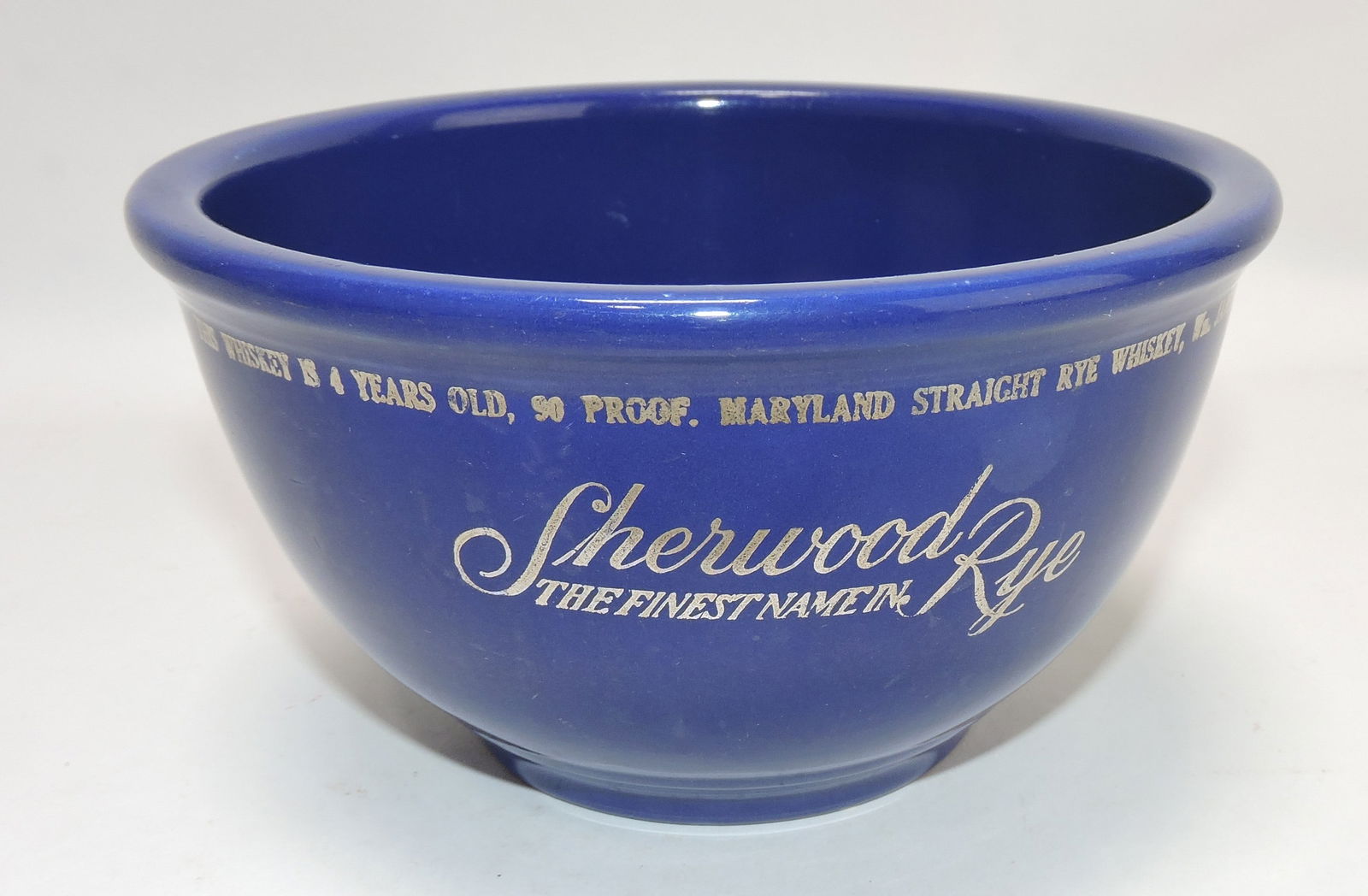 Kitchen Kraft small mixing bowl, cobalt,: 'Sherwood Rye' advertising, chip to bottom