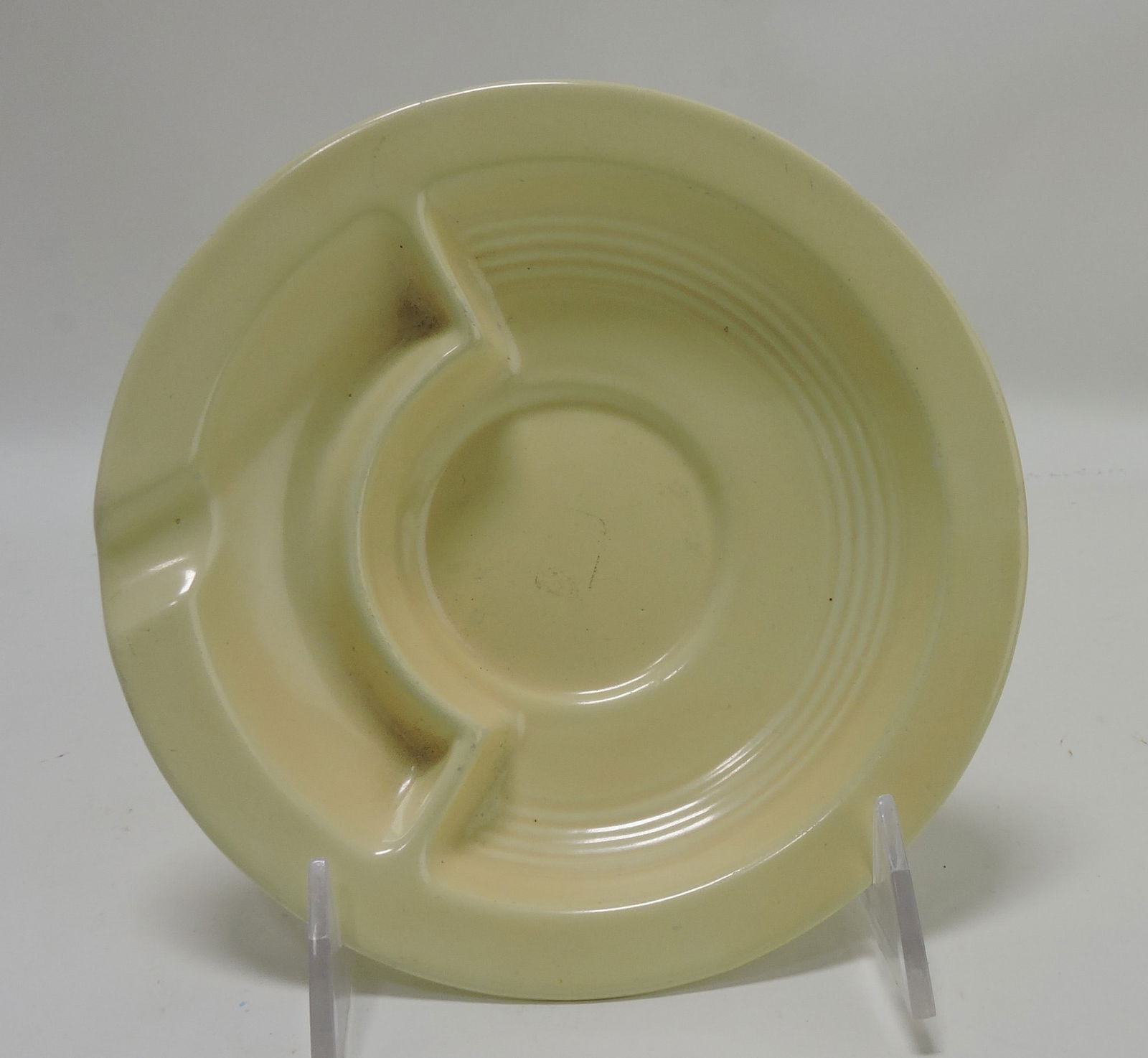 Harlequin saucer ashtray, ivory,: chips to rim