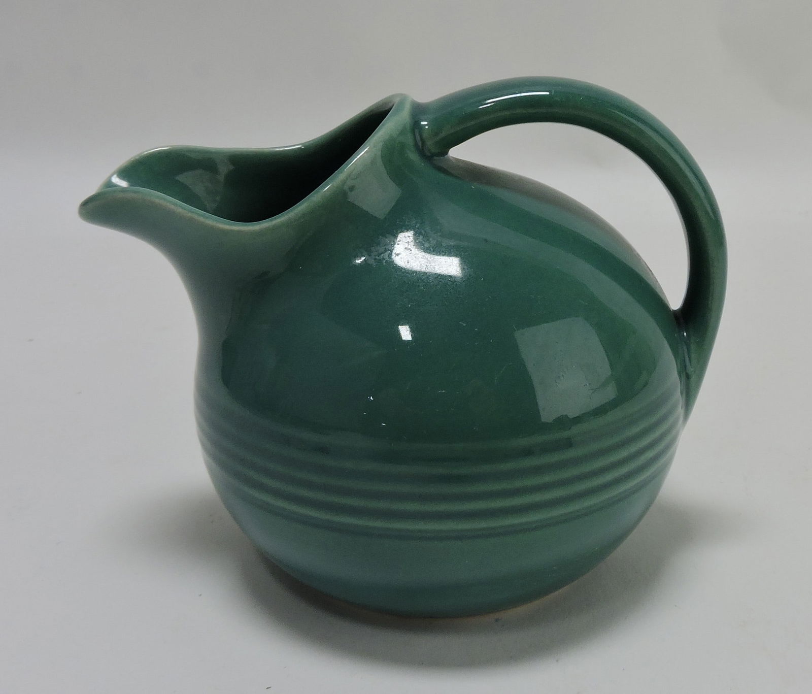 Harlequin novelty creamer, spruce green: .