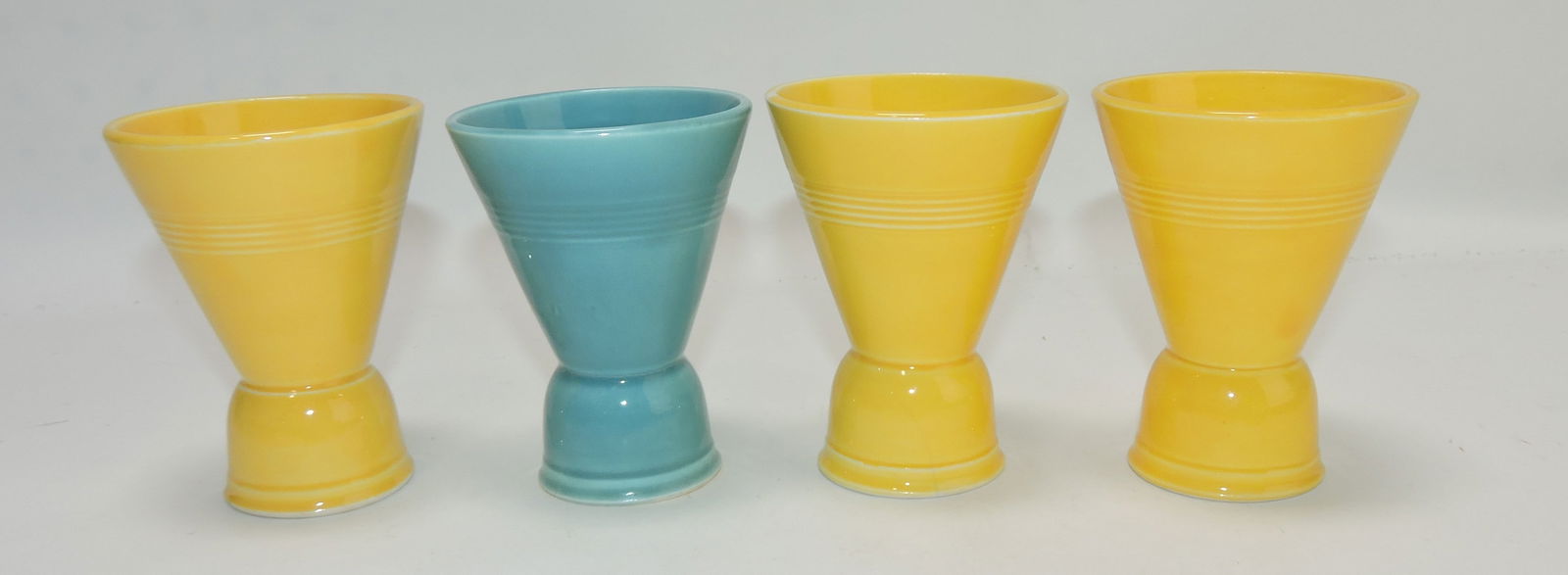 Harlequin double egg cup group,: 4 mixed