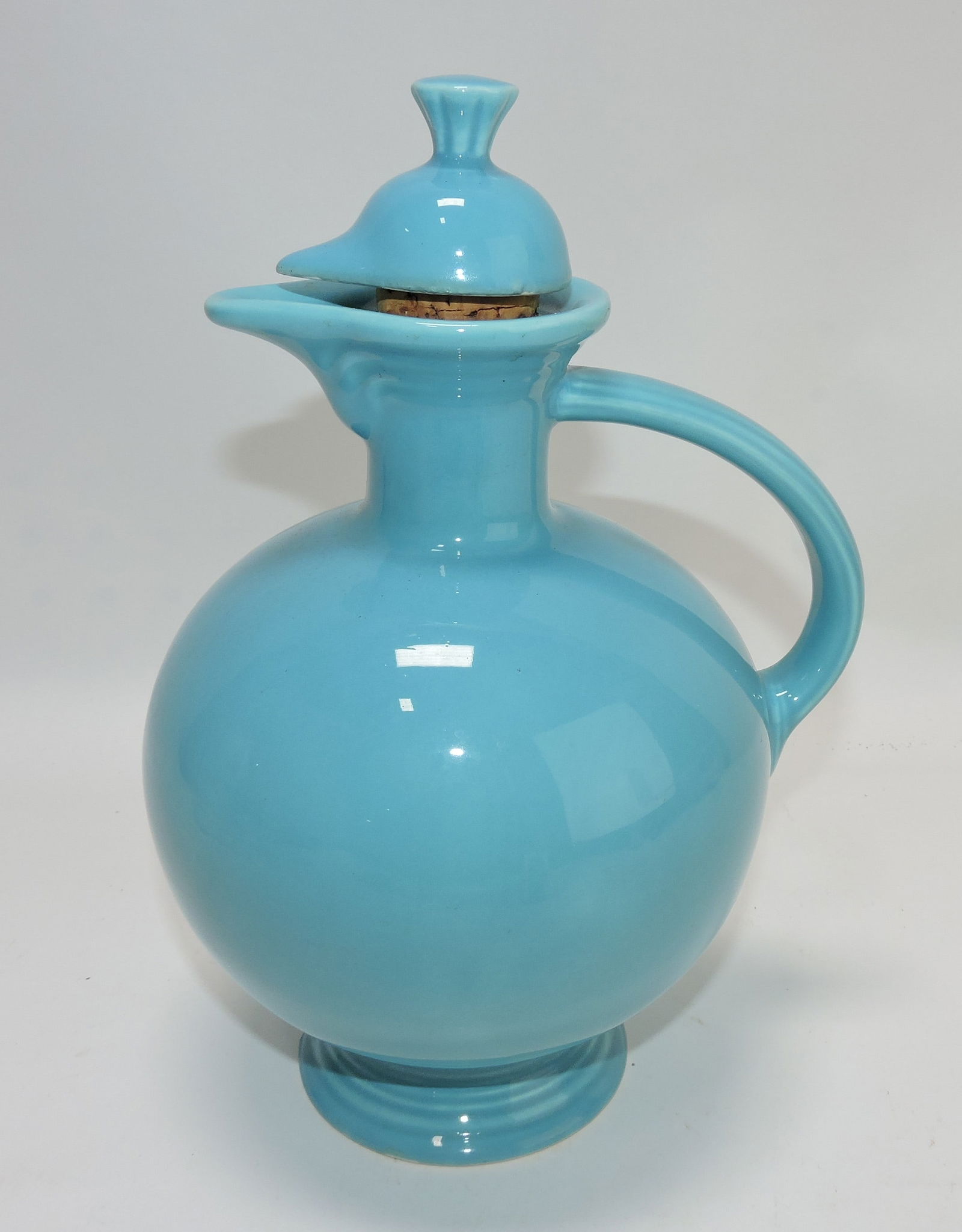 Fiesta carafe, turquoise, chip to foot rim (1 of 1)