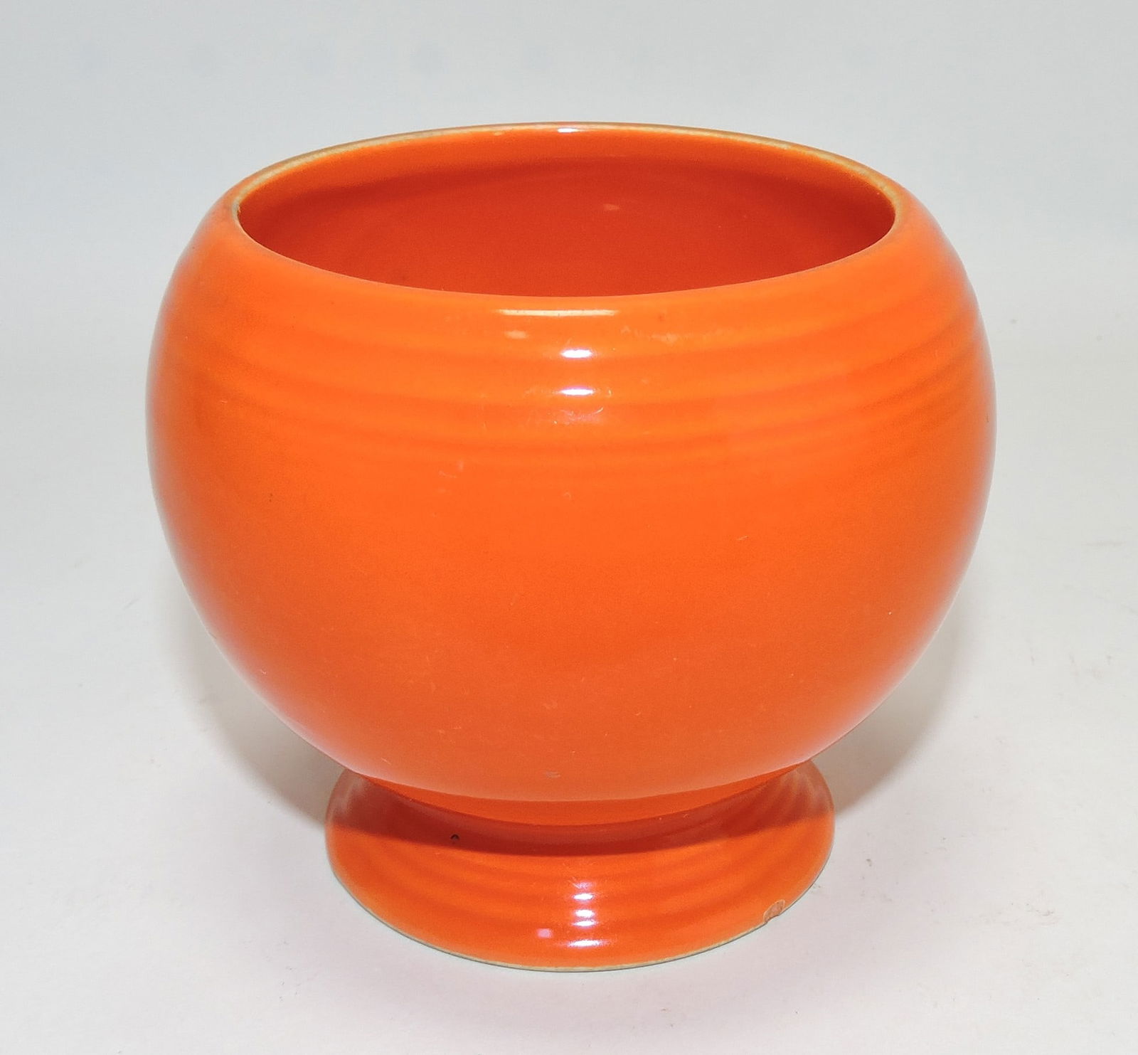 Fiesta marmalade base, red, rim nick (1 of 1)