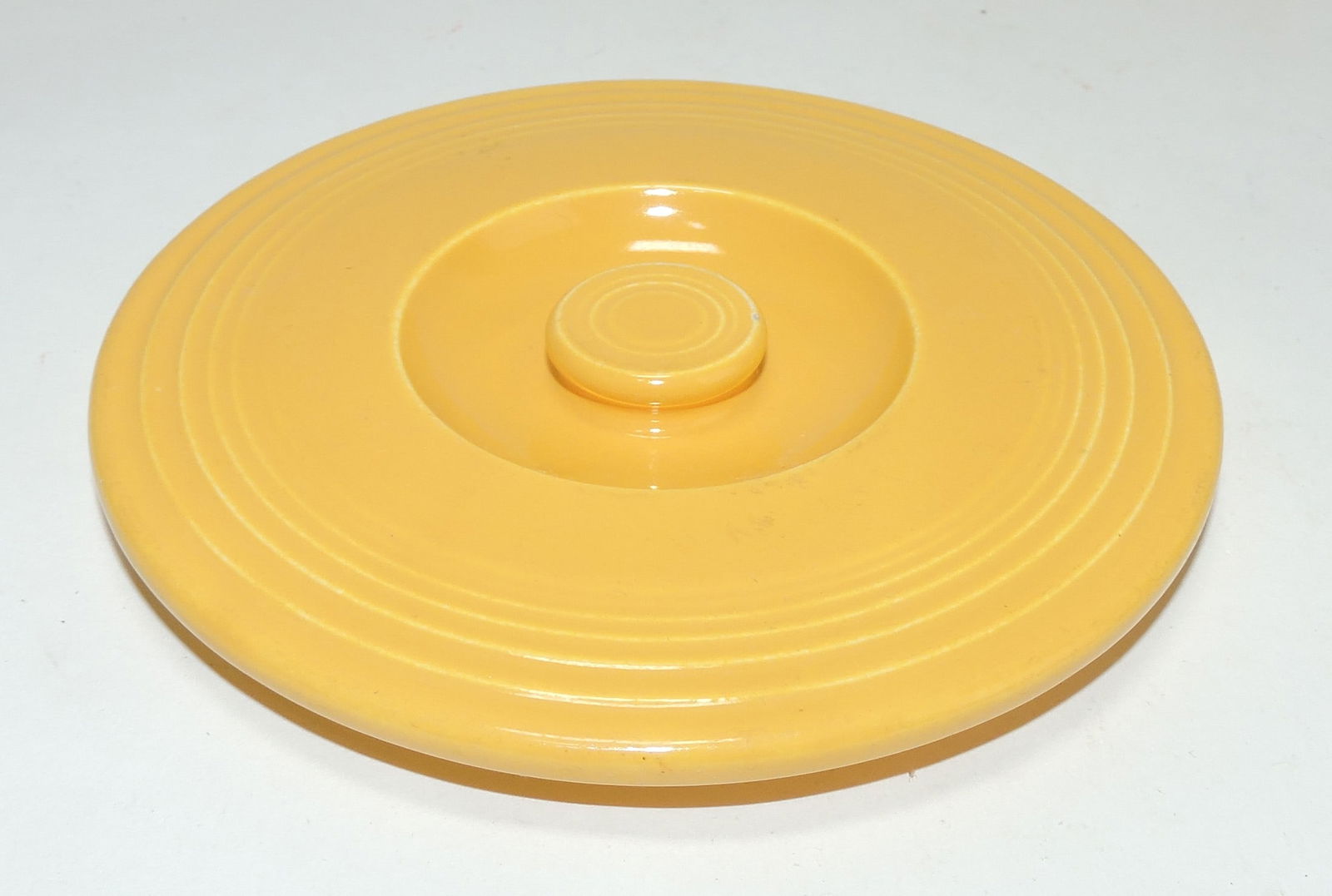 Fiesta #1 mixing bowl lid, yellow, (1 of 2)