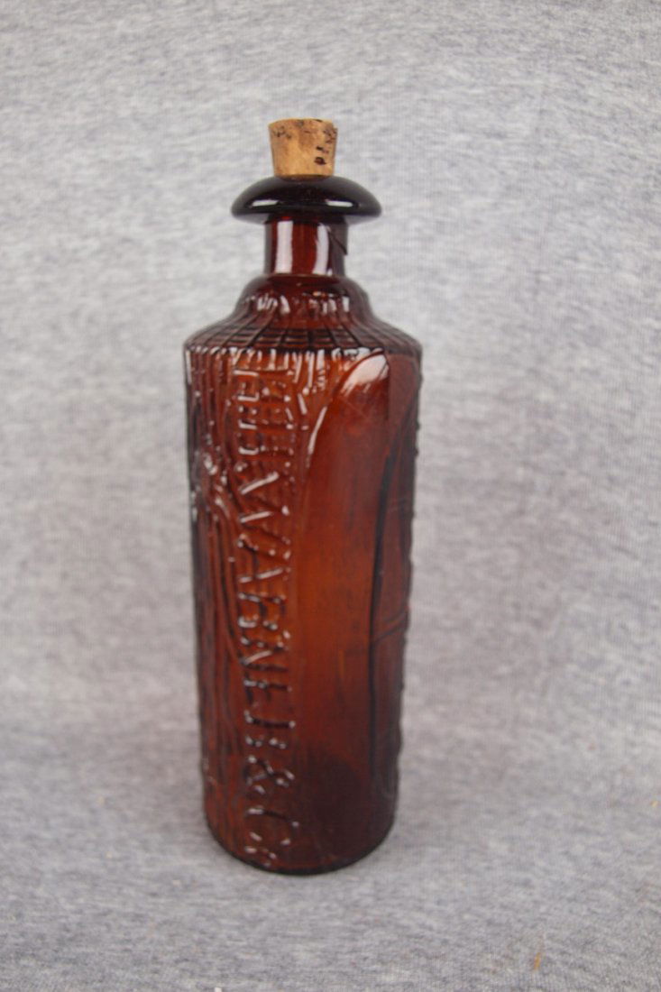 H.H. Warner Tippecanoe amber glass bitters bottle,