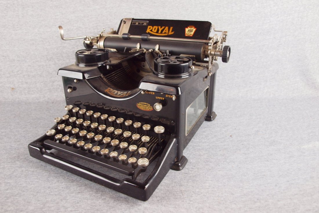 Royal typewriter with glass panels on each side and c: Royal typewriter with glass panels on each side and cover