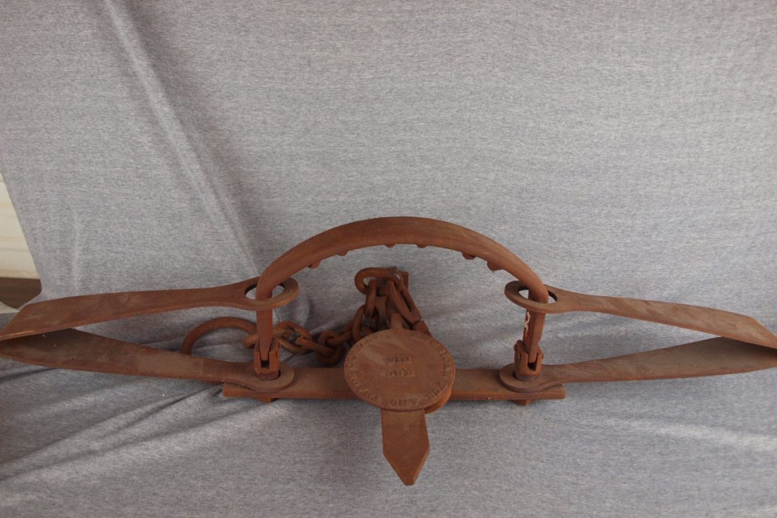 American Fur and Trade Company No. 6 iron bear trap a: American Fur and Trade Company No. 6 iron bear trap and chain , 44"