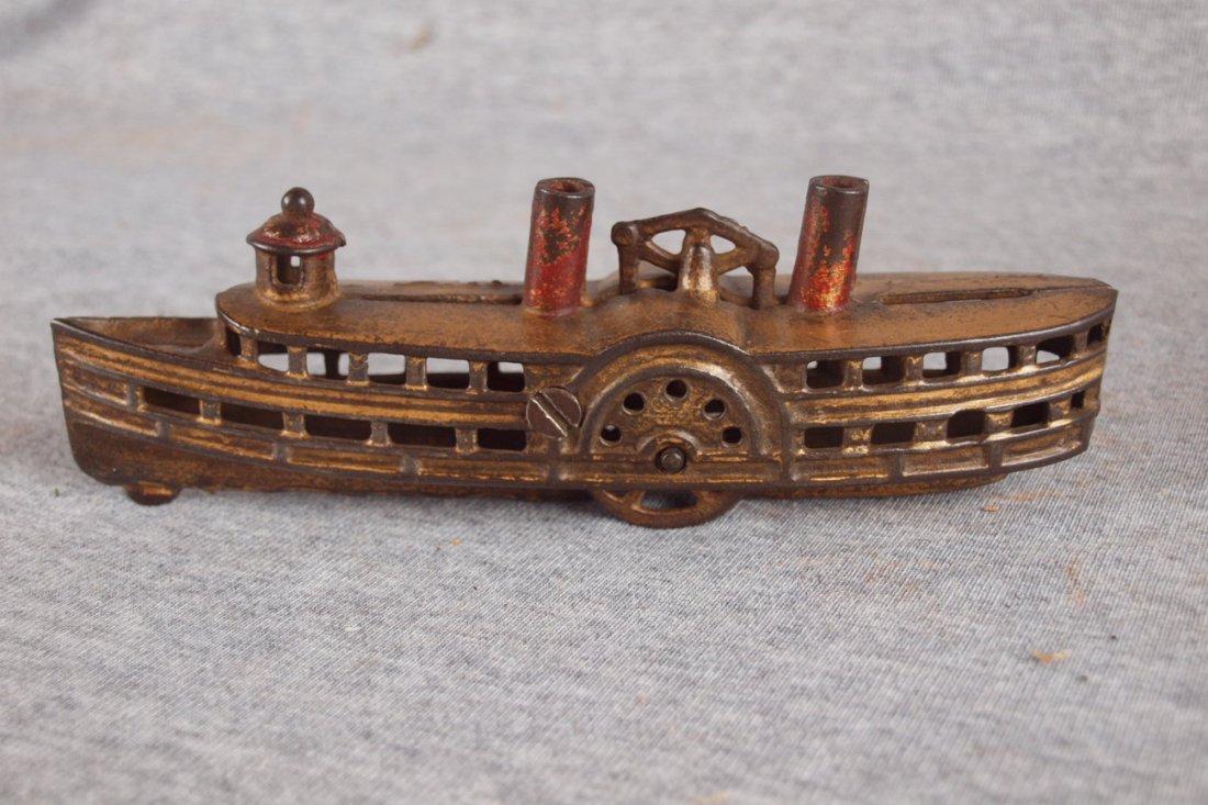 Cast iron still bank of paddle boat, 7 1/2"l : Cast iron still bank of paddle boat, 7 1/2"l