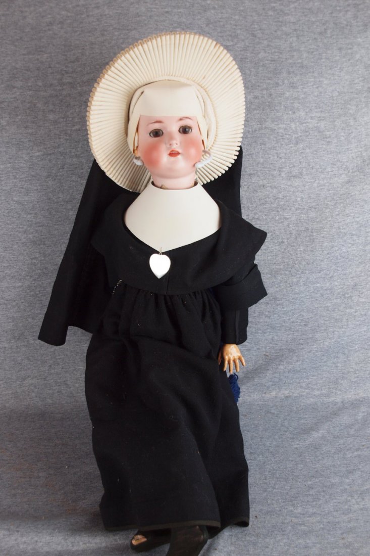 German bisque head doll #182, composition body, dres: German bisque head doll #182, composition body, dressed as nun, 25"