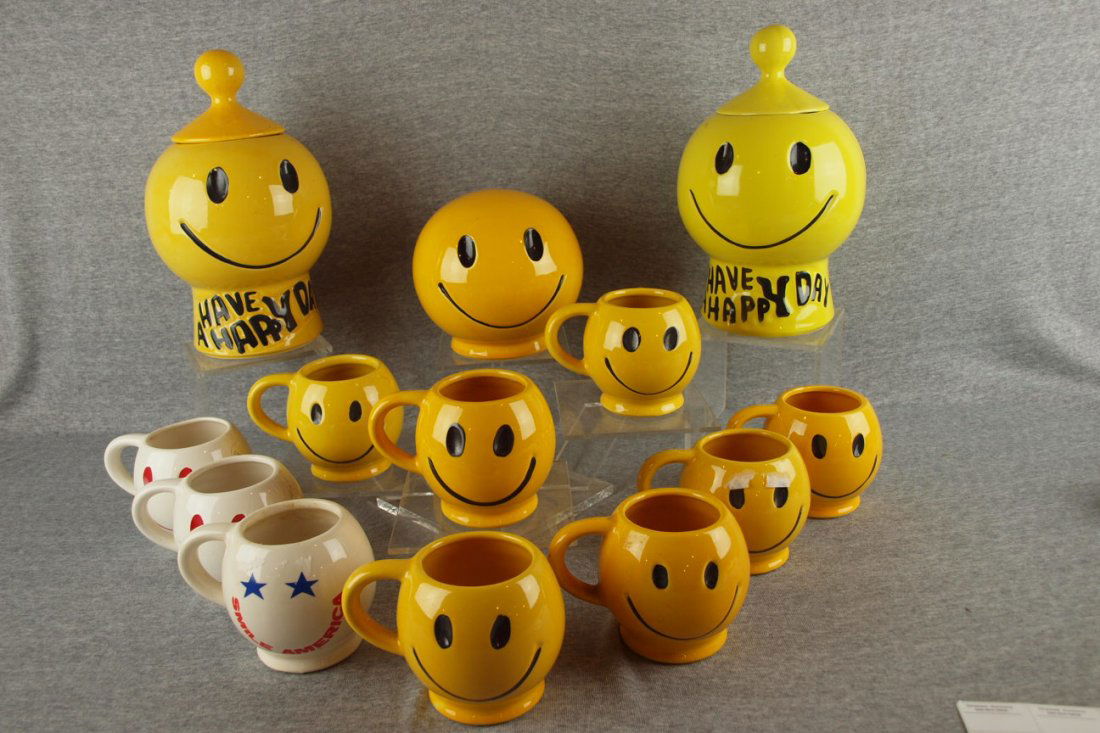 McCoy Pottery Smiley Face group - 2 cookie jars, ban: McCoy Pottery Smiley Face group - 2 cookie jars, bank and 10 mugs