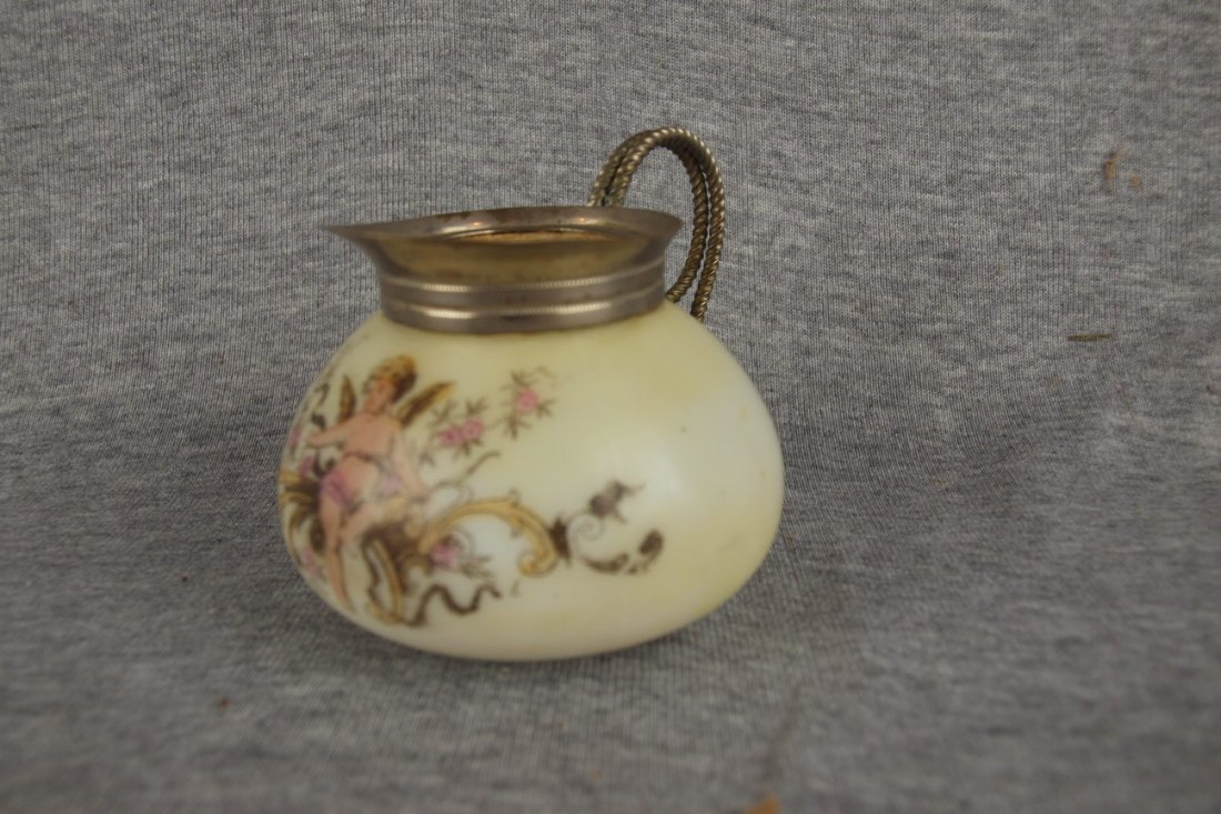 Mt. Washington opaline creamer with cherub and silver