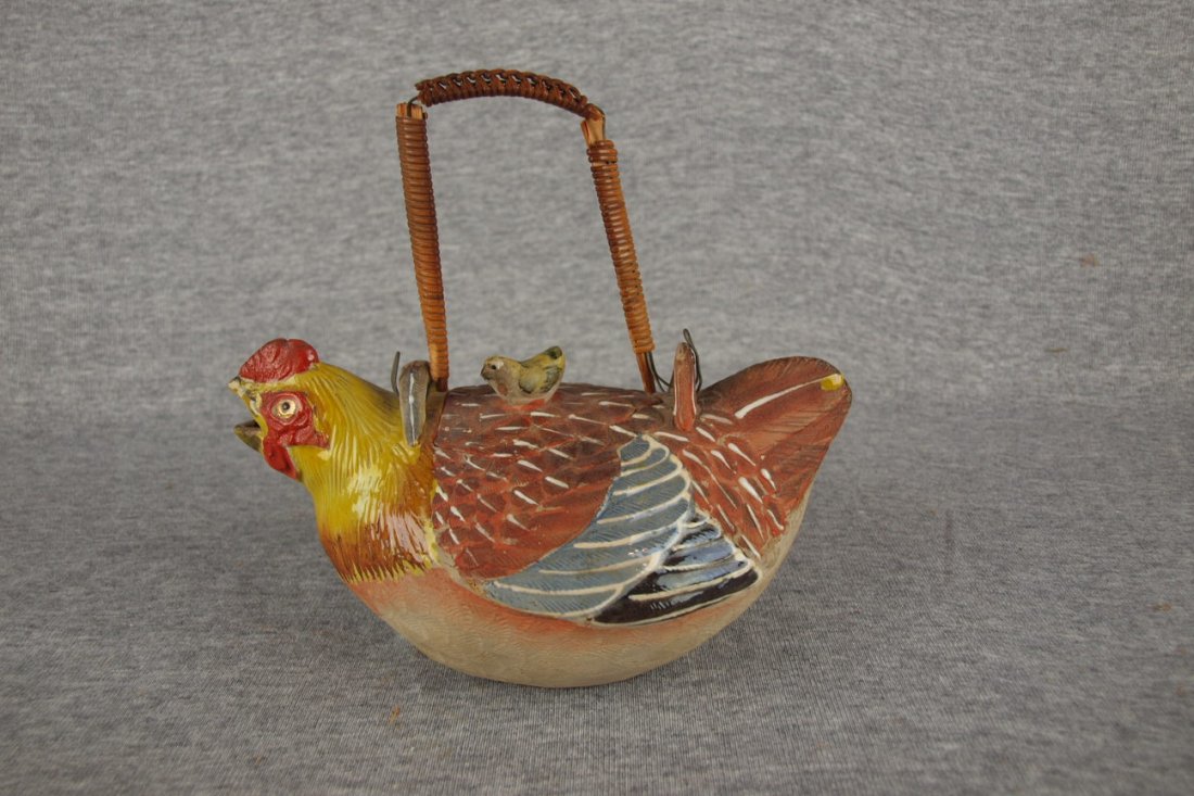 Japanese Banko ware figural teapot of a chicken with: Japanese Banko ware figural teapot of a chicken with enamel feathers, 7"