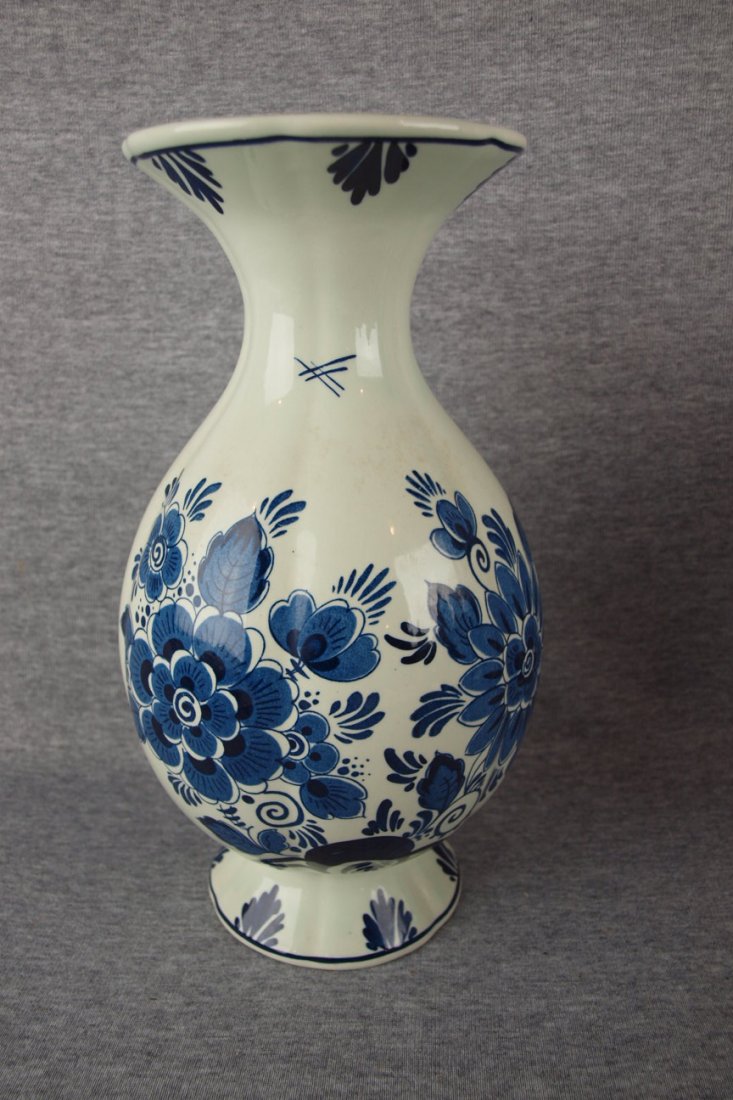 Delft blue and white vase with floral motif, 11 1/2"