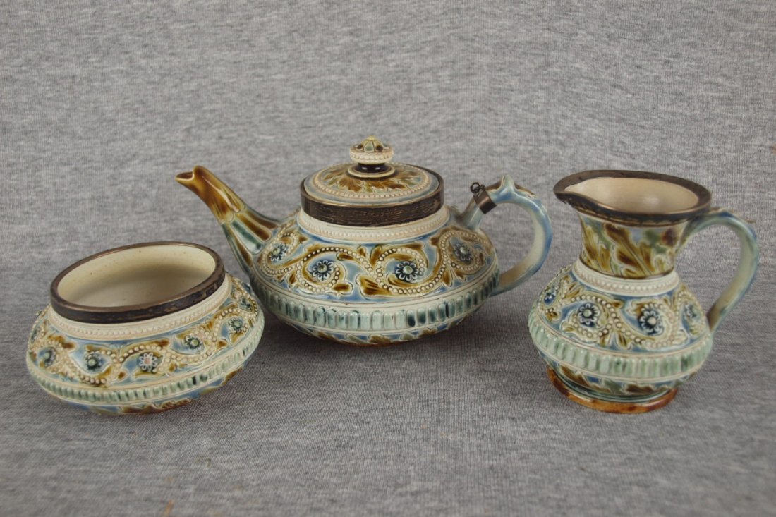 Doulton Lambeth 3 piece teaset with sterling silver r