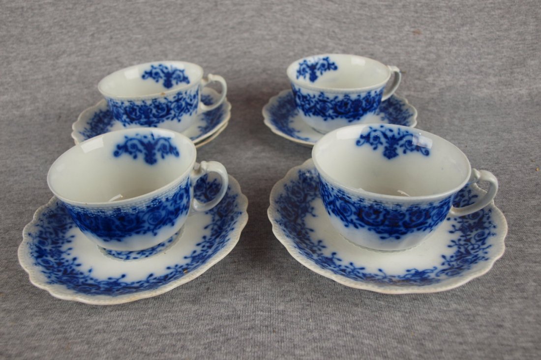 Flow blue set of 4 cups/saucers with extra saucer: Flow blue set of 4 cups/saucers with extra saucer