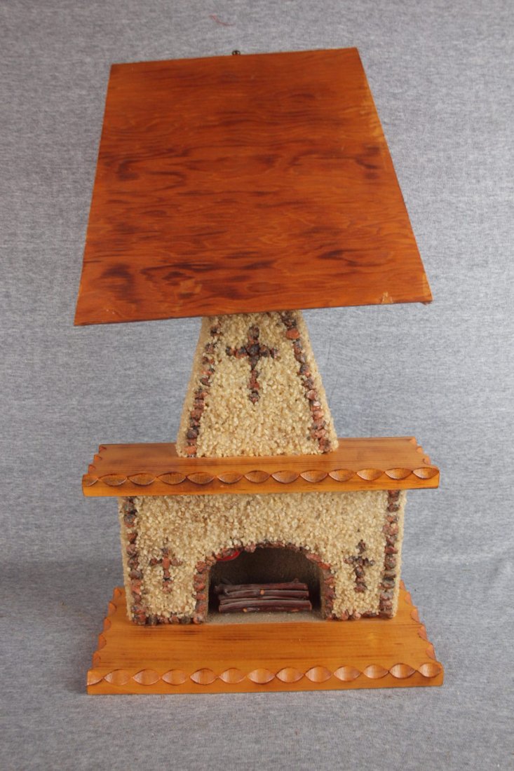 Wooden lodge table lamp in the form of a fireplace a