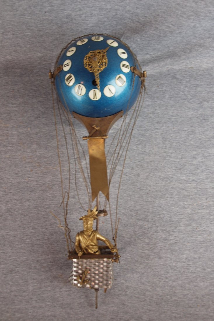 French wall clock in the form of a hot air balloon w: French wall clock in the form of a hot air balloon with man in basket, 18"