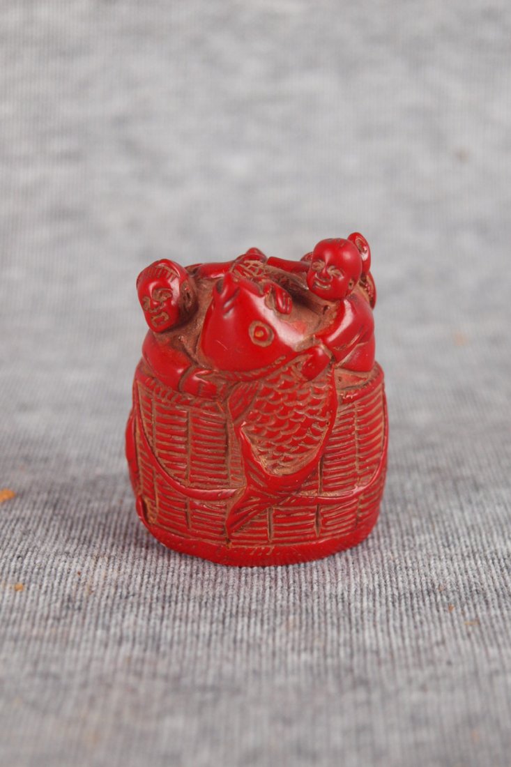 Red coral carved netsuke with Oriental men in basket: Red coral carved netsuke with Oriental men in basket with large carp and two turtles