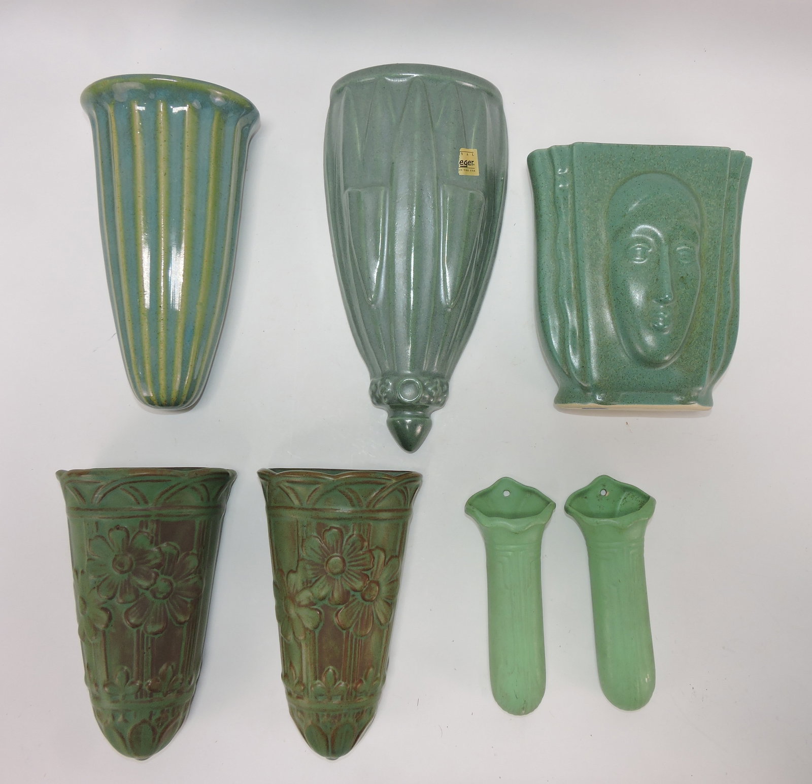 Matte green lot of 7 wall pockets,: 6 1/2" to 11"