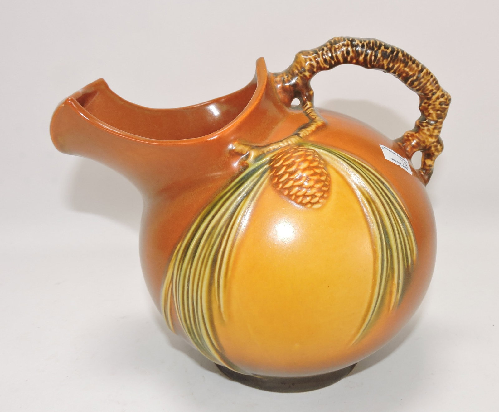 Roseville brown pinecone pitcher, (1 of 1)