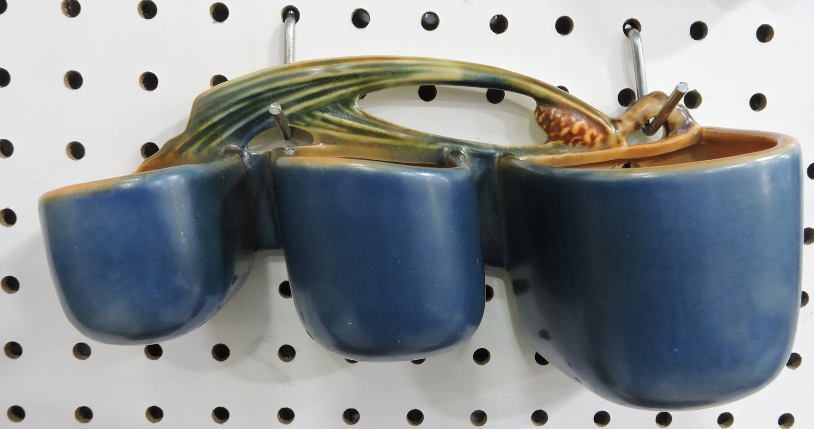 Roseville blue pinecone wall pocket, (1 of 1)