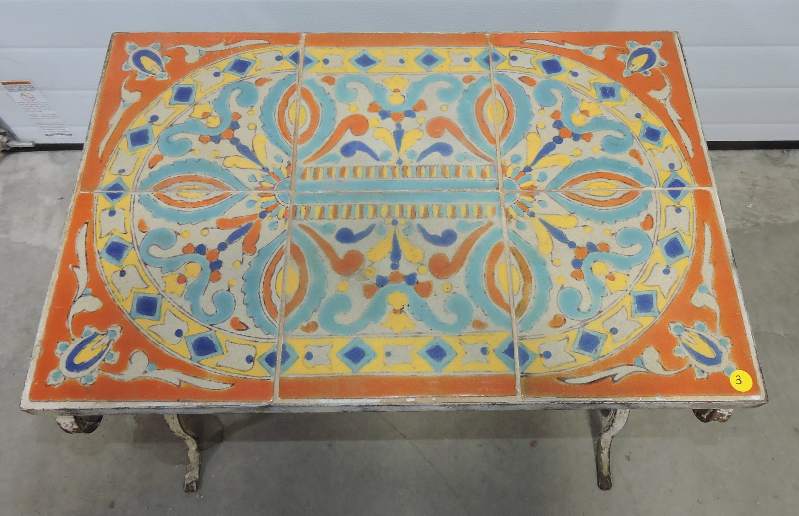 California tile side table with wrought: iron base, 21"h, 25"w, 17"d