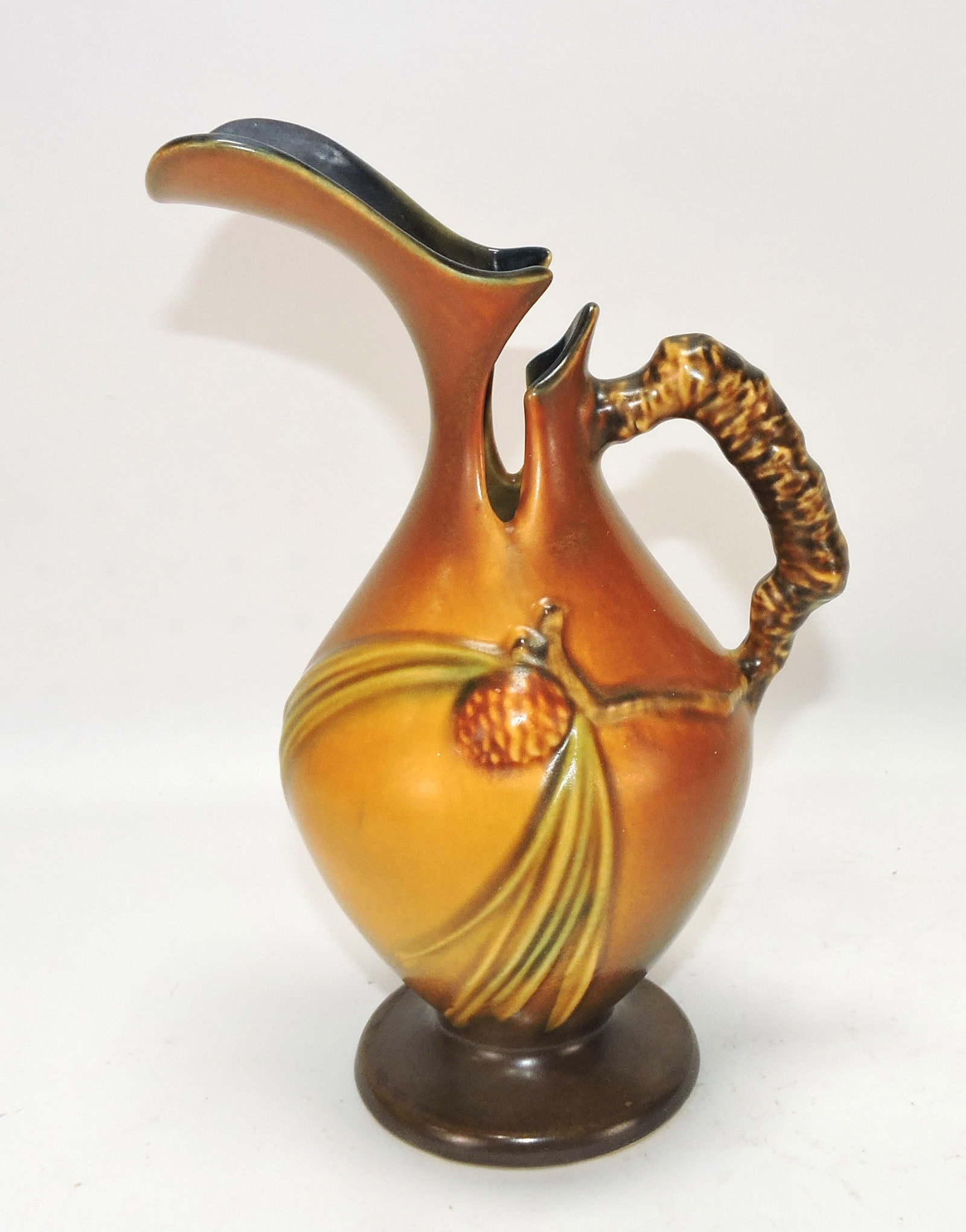 Roseville brown Pinecone ewer, (1 of 1)