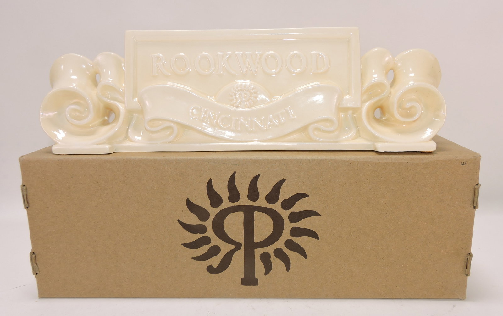 Rookwood shelf sign, ivory,: 4 1/2"h, 14"l, with box