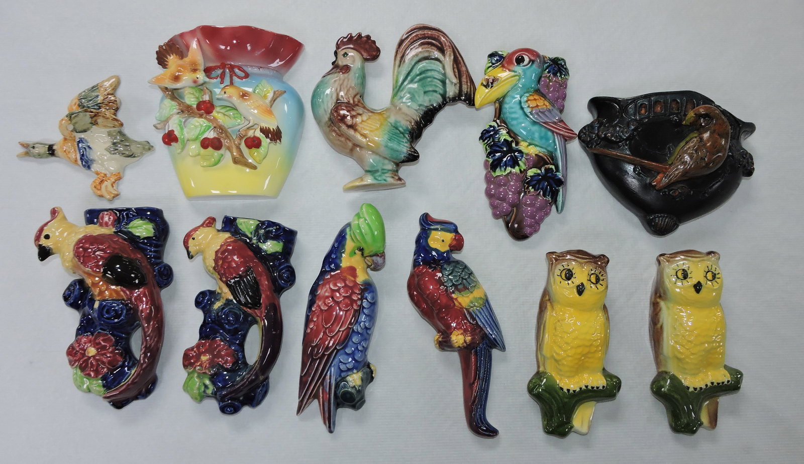 Lot of 11 bird wall pockets: .