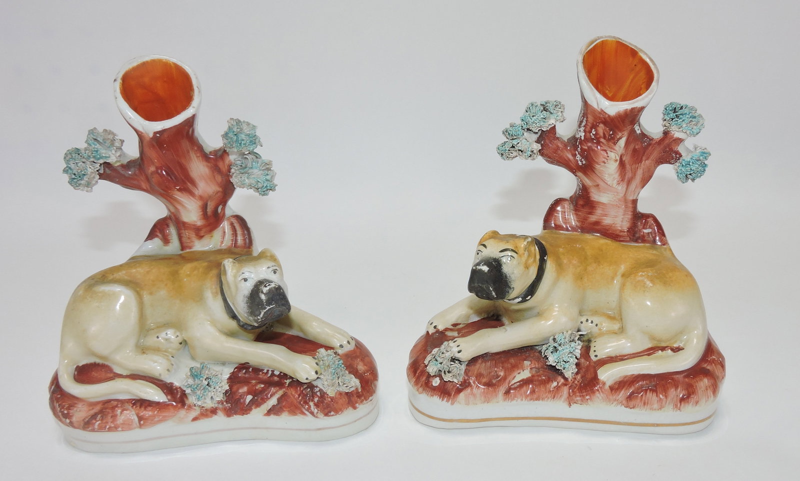Staffordshire pair of dog spill vases,: 6"