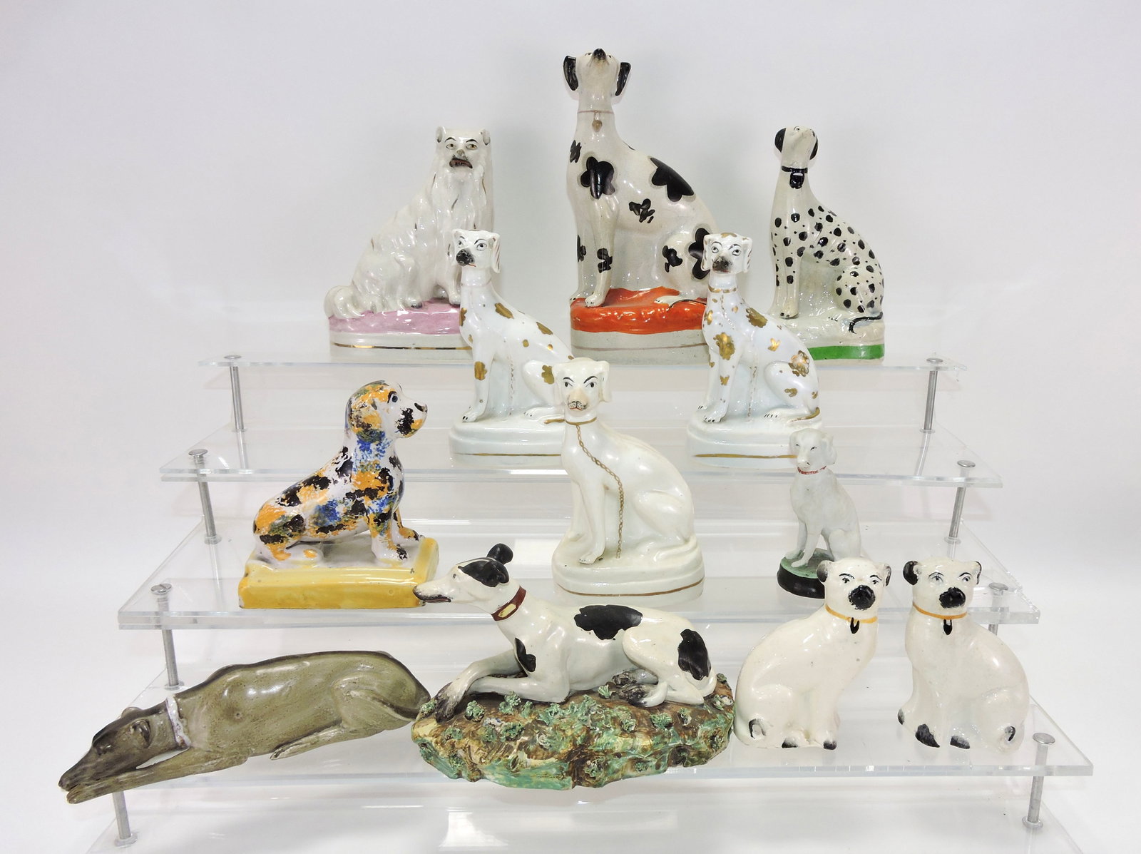 Staffordshire lot of 12 dog figures, (1 of 1)