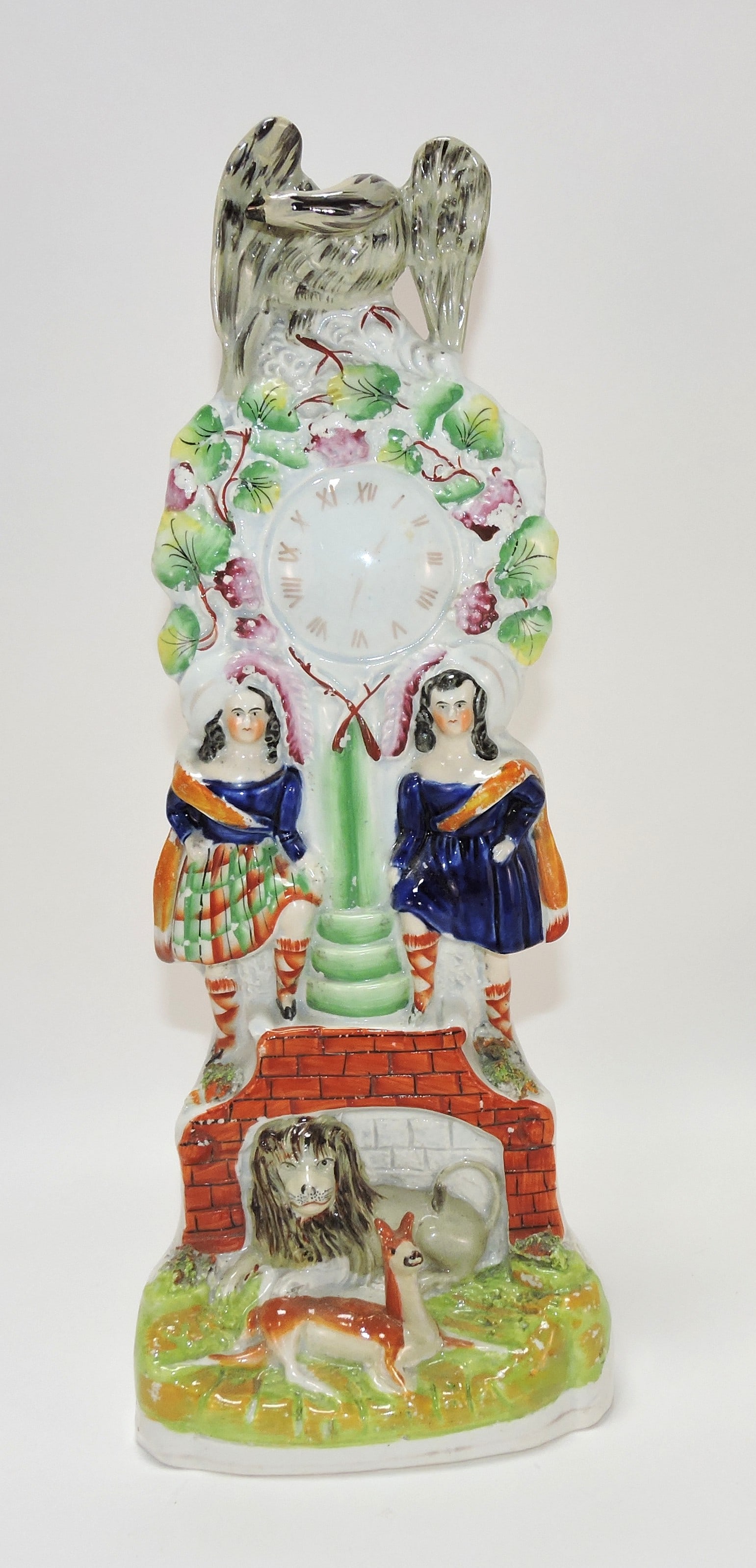 Staffordshire clock figure with Royal (1 of 1)