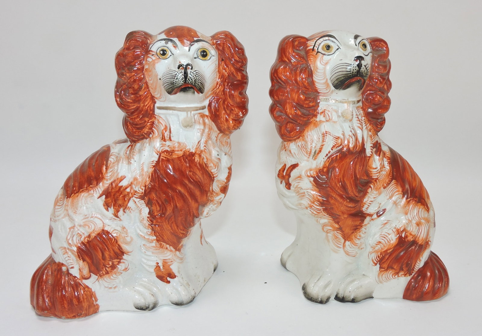 Staffordshire pair of russet spaniels,: 6"
