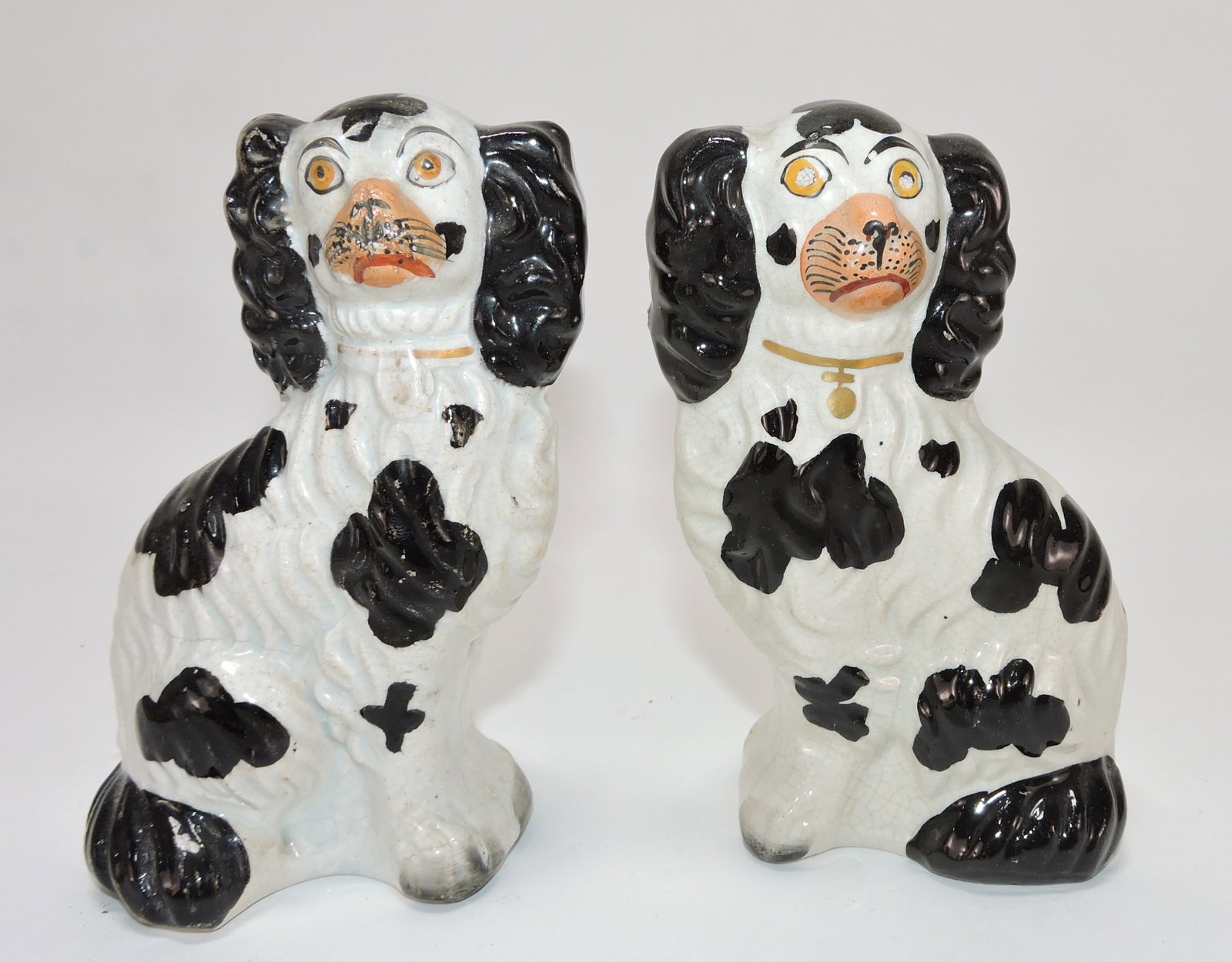 Staffordshire pair of black and white: spaniels, 5"