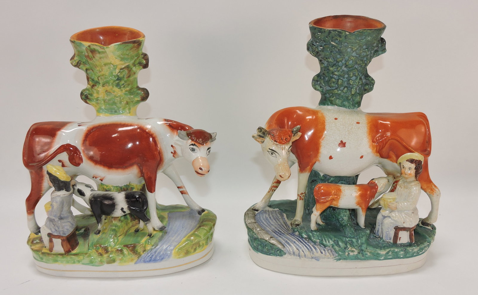 Staffordshire pair of cows spill vases (1 of 1)