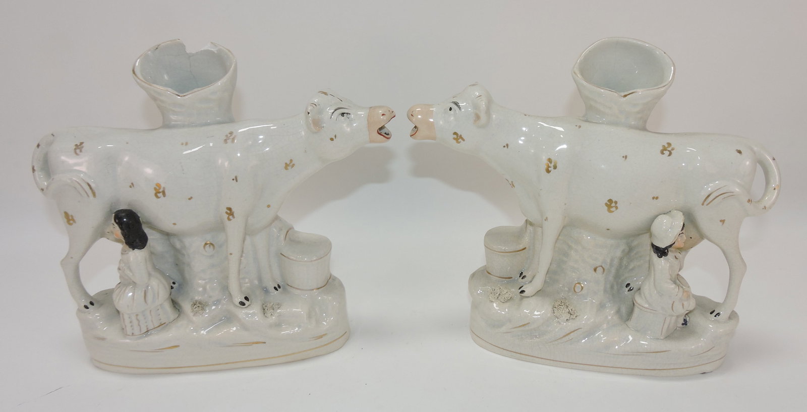 Staffordshire pair of cow spill vases (1 of 1)