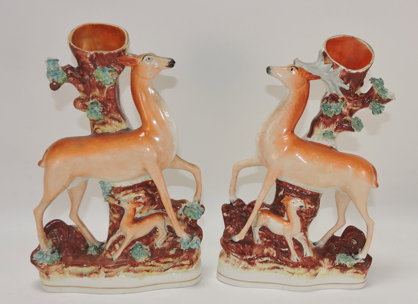 Staffordshire pair of deer spill vases,: 11"