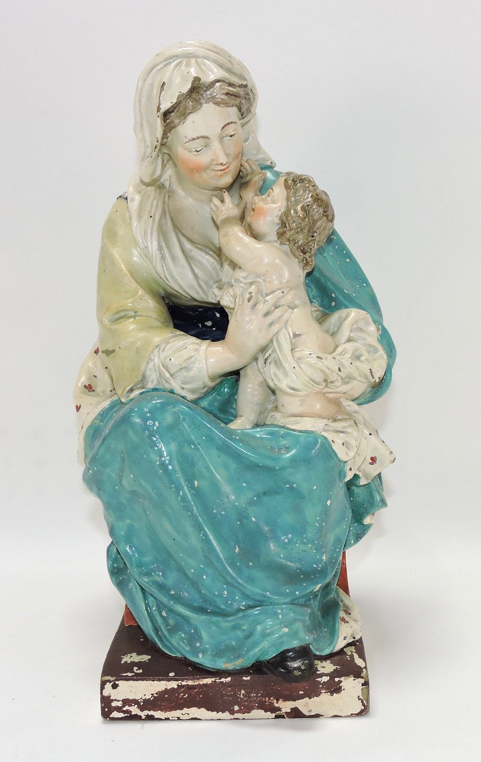 Staffordshire figure of mother and child,: 14", some paint loss
