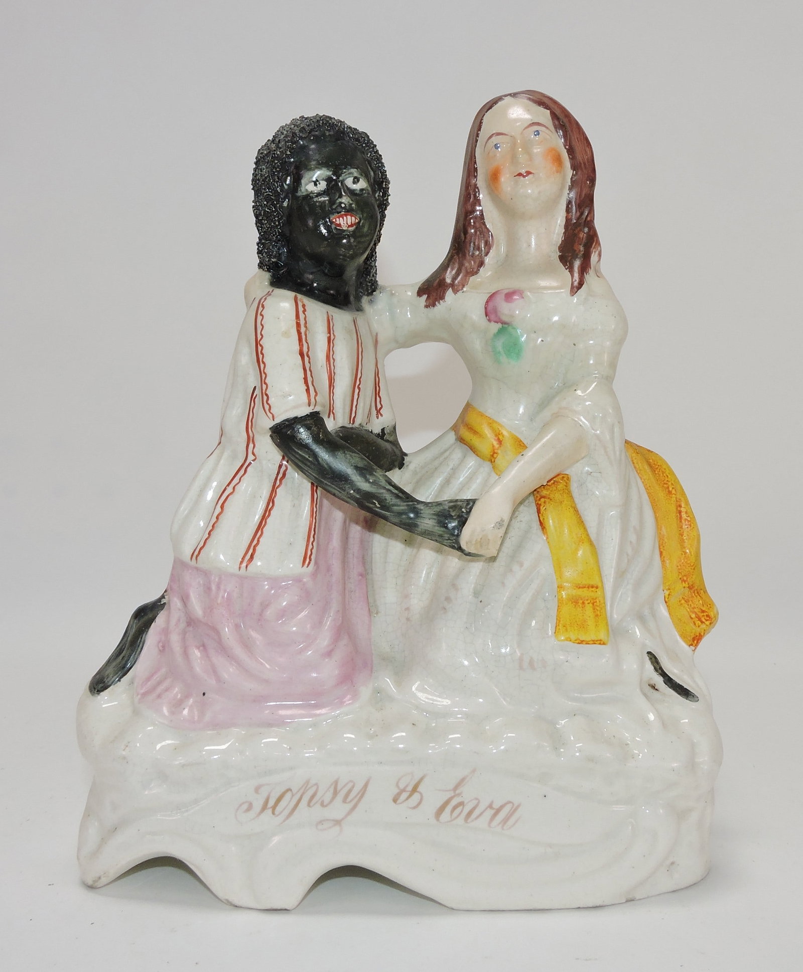 Staffordshire Topsy and Eve figure,: 9 1/2"