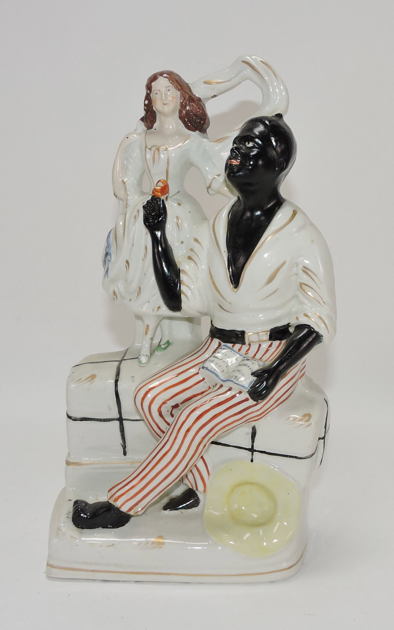 Staffordshire 'Uncle Tom' and Eve figure, (1 of 1)