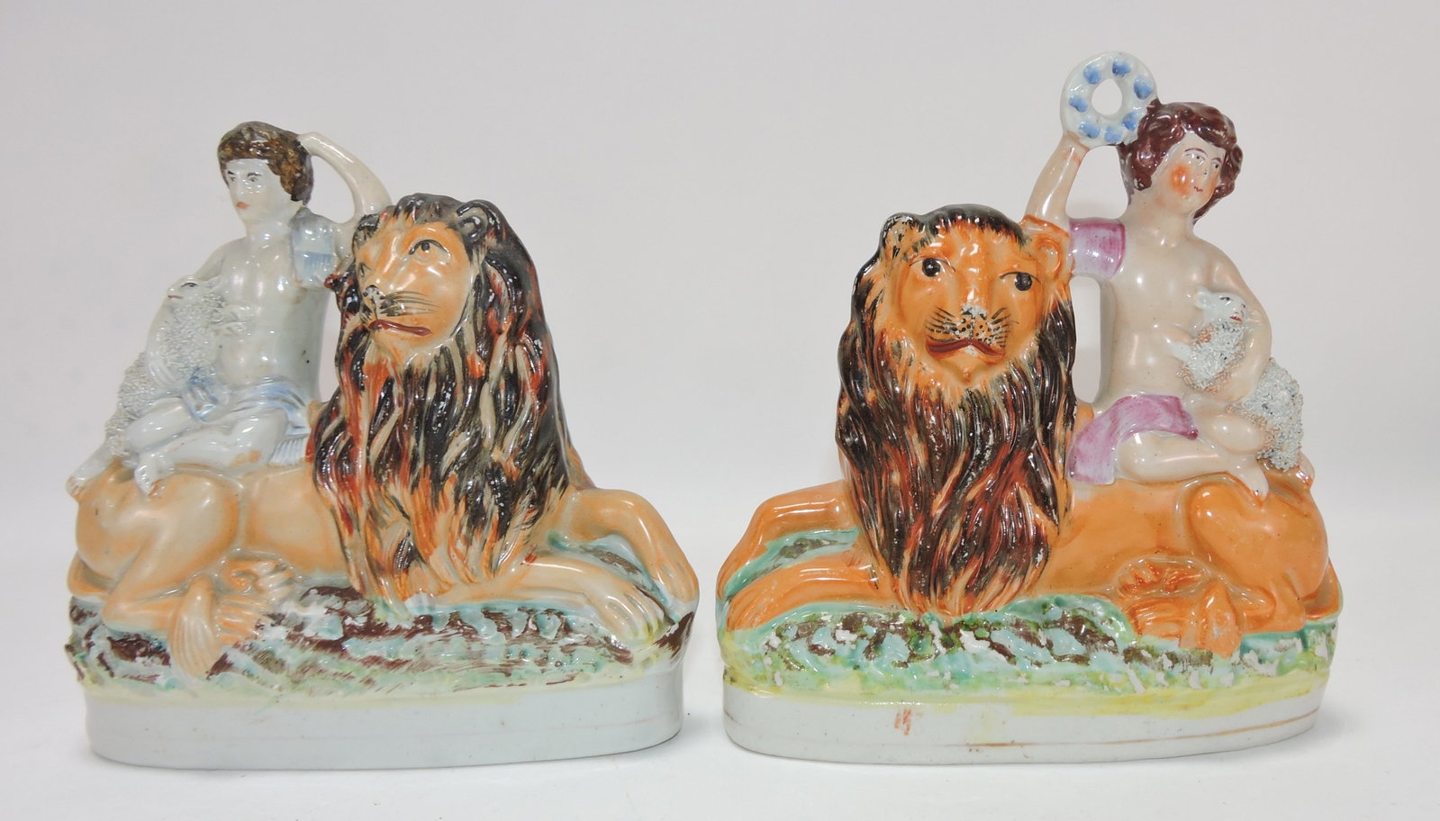 Staffordshire pair of lion figures, 6 1/2": .