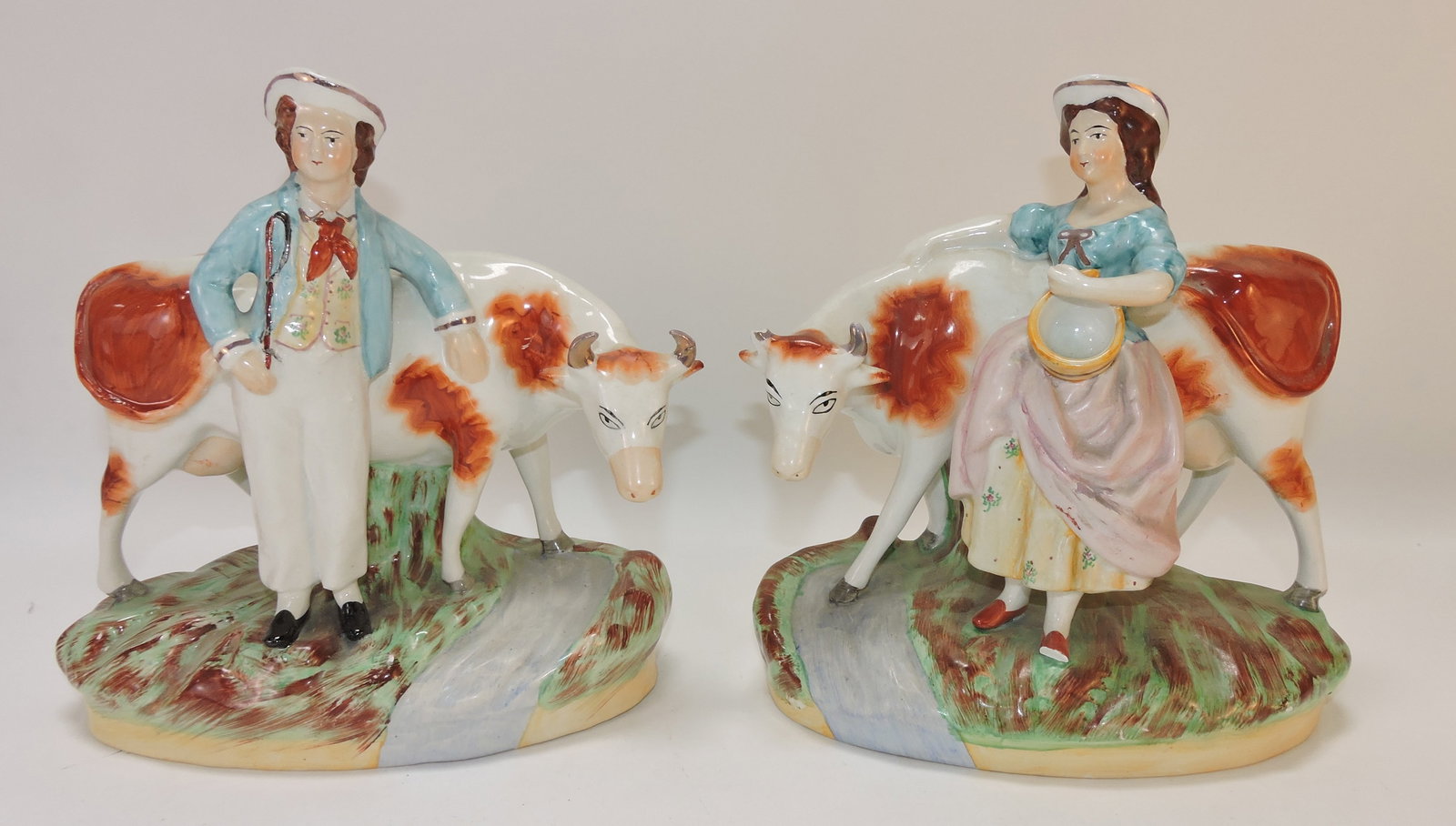 Staffordshire pair of cow figures with (1 of 1)