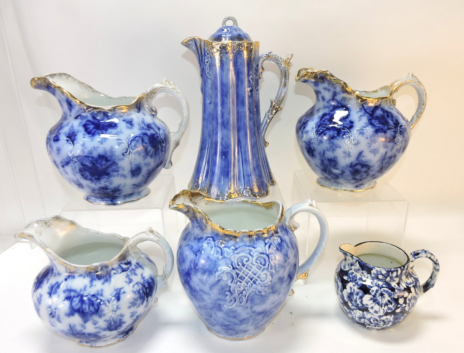 Warwick flow blue lot of 5 pitchers and: chocolate pot, 4" to 10", various condition