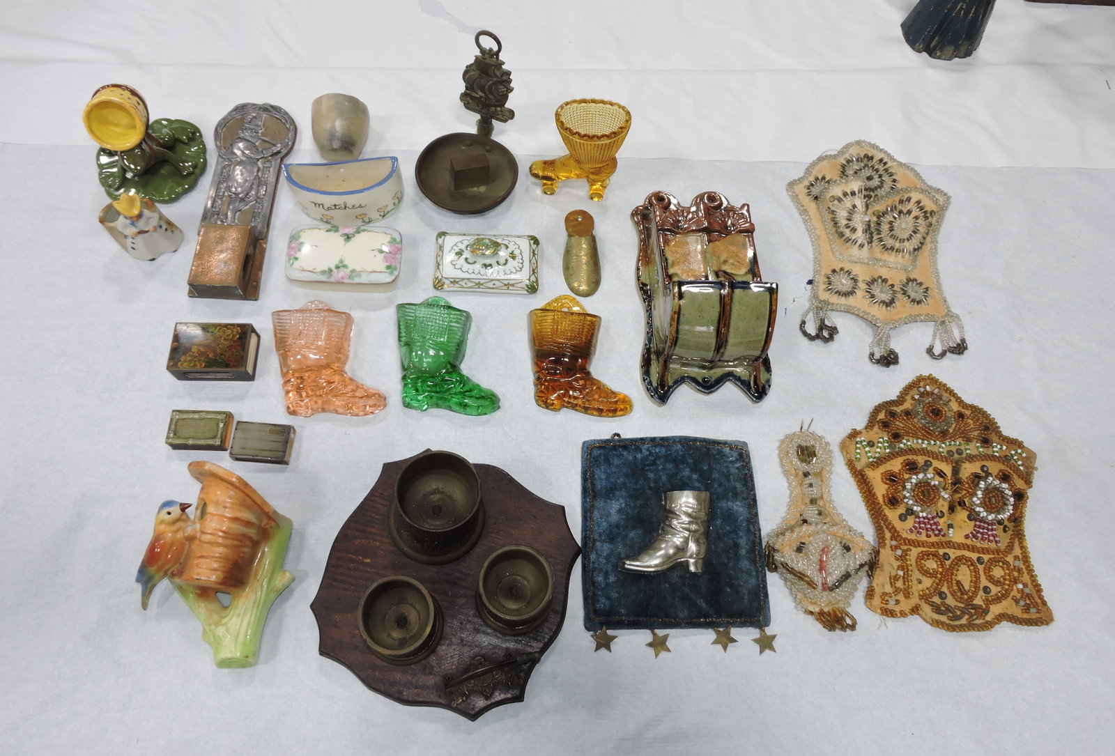 Lot of assorted match holders: .
