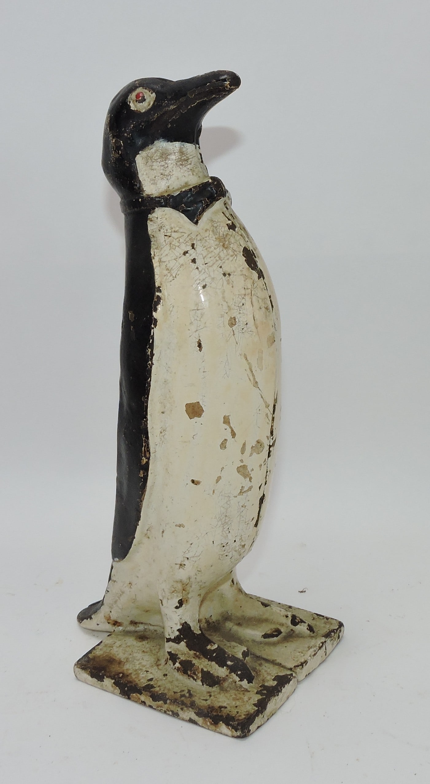 Cast iron penguin doorstop, 10 1/2": .