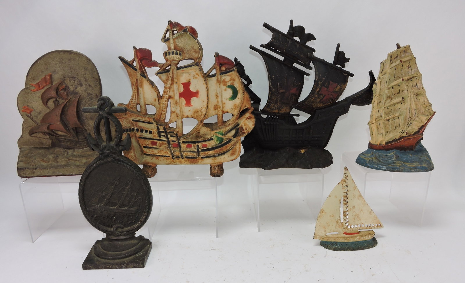 Cast iron lot of 6 sailboat doorstops,: 5" to 11"