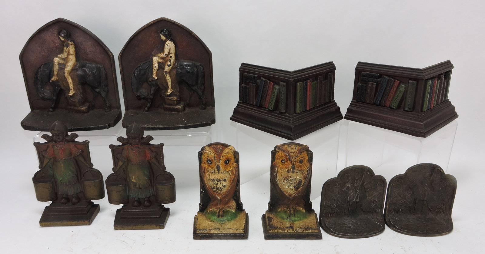 Cast iron lot of 5 pair of bookends,: 4" to 7"