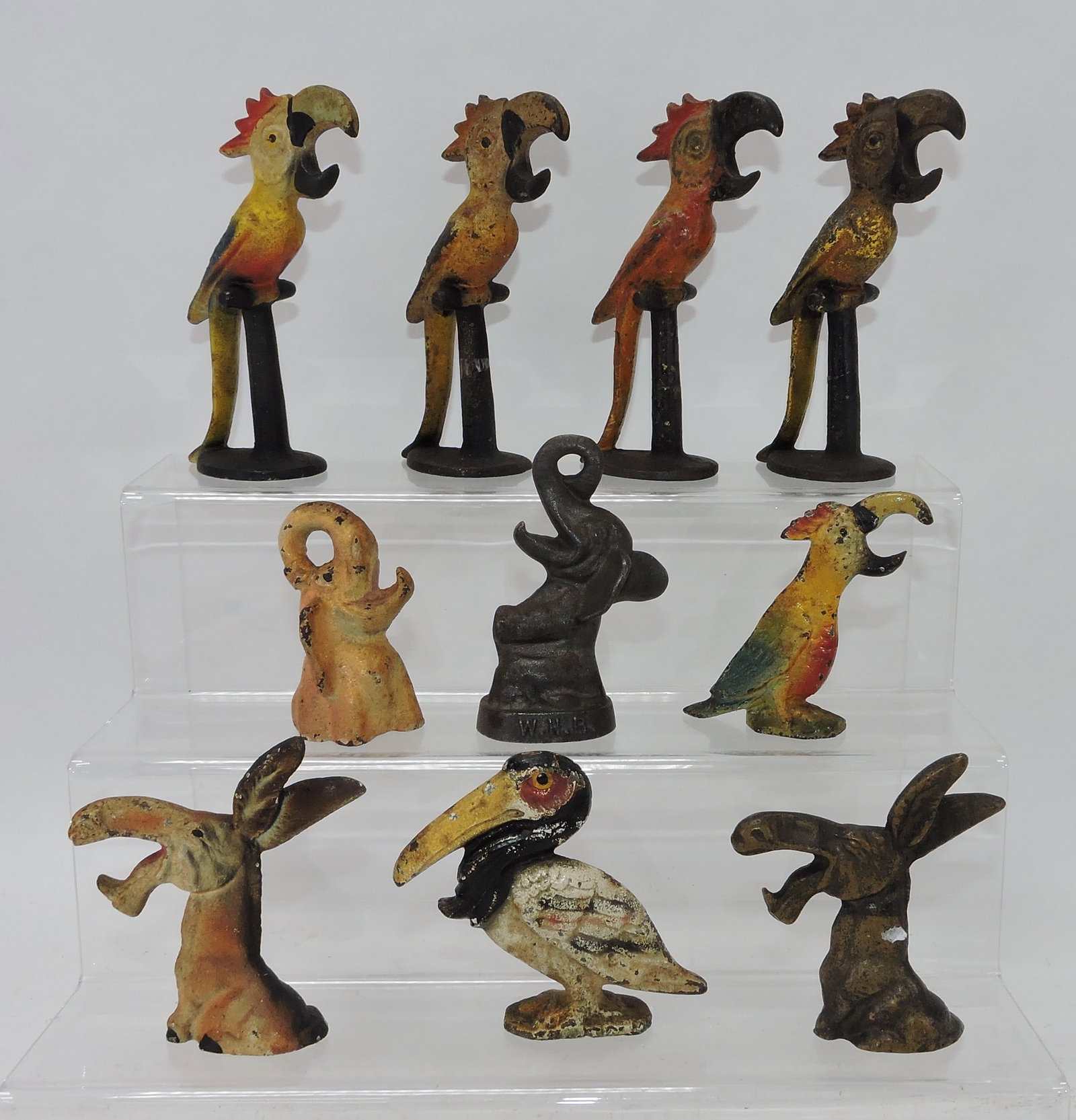 Cast iron lot of 10 figural bottle openers: .